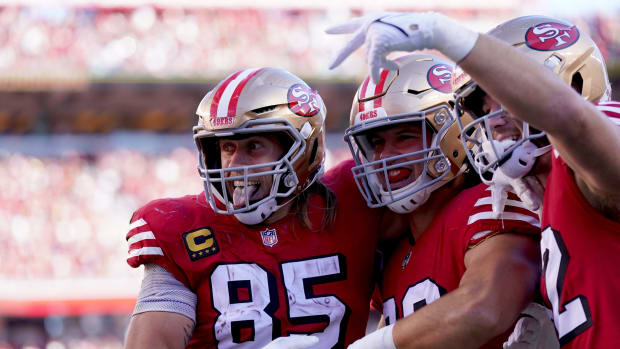49ers tight ends George Kittle, Charlie Woerner and Ross Dwelley celebrating after Kittle scored a touchdown. Kittle loves National Tight Ends Day, which was Sunday in Week 7.